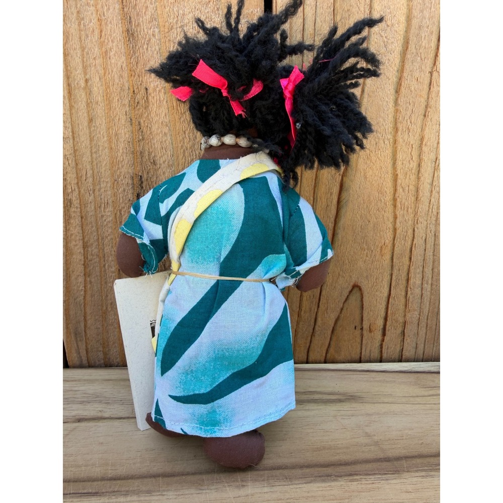 Handmade Fijian cloth doll, wearing a green and white batik dress - Picture 3 of 5